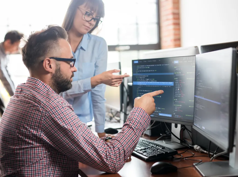 a man showing something on the computer